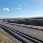 2 km 69+200 ułożone warstwy asfaltowe (przeciwnie do km)