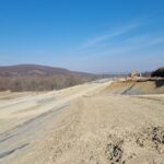 15 km 75+000 ułożone warstwy nawierzchni, roboty ziemne (przeciwnie do km)