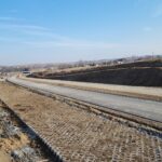 2 km 69+200 ułożone warstwy asfaltowe (przeciwnie do km)
