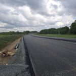 10 km 74+170 ułożone warstwy asfaltowe (przeciwnie do km)
