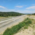 14 km 75+000 ułożone warstwy nawierzchni, roboty ziemne (przeciwnie do km)